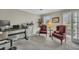 Functional home office with a desk and seating, ideal for remote work or study at 4950 Willow Creek Dr, Woodstock, GA 30188
