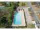 Bird's eye view of a community pool showcasing swimming lanes and adjacent parking at 4950 Willow Creek Dr, Woodstock, GA 30188