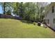 A spacious, fenced backyard provides privacy and room for outdoor activities and gardening at 105 Whisper Way, Dacula, GA 30019