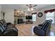 Spacious living room featuring a stone fireplace and hardwood floors at 105 Whisper Way, Dacula, GA 30019