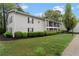 Apartment building with lush green lawns and landscaping around the community at 1150 Collier Nw Rd # A7, Atlanta, GA 30318