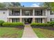 Apartment building showcasing two floors and manicured landscaping at 1150 Collier Nw Rd # A7, Atlanta, GA 30318