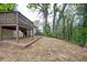 Expansive backyard featuring a patio, mature trees, and lush surroundings at 2190 Highview Rd, Atlanta, GA 30311