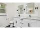 Bright bathroom with dual vanity, stylish mirrors, and modern fixtures at 2190 Highview Rd, Atlanta, GA 30311