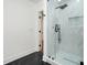 Bright bathroom with shower, with glass surround and marble tile walls at 2190 Highview Rd, Atlanta, GA 30311