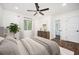 Bedroom with neutral paint, light colored furniture, ensuite bathroom and accent plant at 2190 Highview Rd, Atlanta, GA 30311