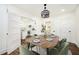 Elegant dining room with stylish table setting and decor, and a modern chandelier at 2190 Highview Rd, Atlanta, GA 30311