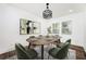 Elegant dining room with stylish table setting and decor, and a modern chandelier at 2190 Highview Rd, Atlanta, GA 30311