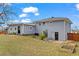 Exterior view of the backyard featuring a patio, and garden beds at 2984 Bayard St, East Point, GA 30344
