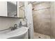 Bathroom features a tiled shower, modern fixtures, and neutral decor at 2984 Bayard St, East Point, GA 30344