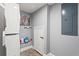 Efficient laundry area with stacked washer and dryer and utility access at 2984 Bayard St, East Point, GA 30344