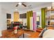 Cozy living room with a modern media center and eclectic shelving at 2984 Bayard St, East Point, GA 30344