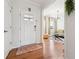 Inviting entryway showcases hardwood floors and stylish decor, leading into a bright living space at 2815 Paddle Point Ln, Cumming, GA 30041