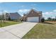 Charming single-Gathering home boasts a well-manicured lawn and inviting two-car garage, perfect for suburban living at 2815 Paddle Point Ln, Cumming, GA 30041