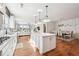 Bright, open kitchen with a large island, modern appliances, and hardwood floors, perfect for cooking and entertaining at 2815 Paddle Point Ln, Cumming, GA 30041