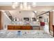 Open-concept kitchen featuring an island with seating, enhancing culinary experiences and social interaction at 90 Belleview Rdg, Sharpsburg, GA 30277