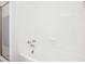 Clean, white bathtub and shower combination at 10386 Wisteria Ln, Jonesboro, GA 30238