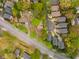 Aerial view of neighborhood featuring mature trees and diverse architectural styles at 1387 Church St, Decatur, GA 30030