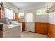 Laundry room featuring white washer and dryer, white walls and tile flooring at 1387 Church St, Decatur, GA 30030