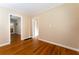 Bright and spacious, this living room features classic hardwood floors and neutral walls at 1387 Church St, Decatur, GA 30030