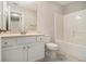 This bathroom features a shower and tub combo at 206 Oak Grove Way, Acworth, GA 30102
