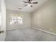 This bedroom offers a large window to let natural light in at 206 Oak Grove Way, Acworth, GA 30102
