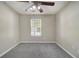 The bedroom features carpeted floors and a ceiling fan at 206 Oak Grove Way, Acworth, GA 30102