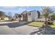 Two story home with a well-manicured lawn, palm tree and white picket fence at 206 Oak Grove Way, Acworth, GA 30102