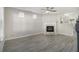 Bright living room with hardwood floors, a decorative fireplace, and lots of natural light at 206 Oak Grove Way, Acworth, GA 30102