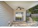 This patio offers a ceiling fan and sliding door at 206 Oak Grove Way, Acworth, GA 30102