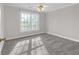 Nice carpeted bedroom with ceiling fan and window at 240 River Cove Mdws, Social Circle, GA 30025