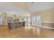 Open-concept kitchen featuring a large island, stainless steel appliances, and ample natural light at 240 River Cove Mdws, Social Circle, GA 30025