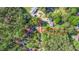 Aerial view showing property lines and surroundings in a wooded neighborhood at 3578 Hope Rd, Cumming, GA 30041