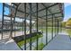Covered boat dock featuring a metal frame, wooden deck, boat slip and ladder access to a rooftop deck overlooking the lake at 3578 Hope Rd, Cumming, GA 30041