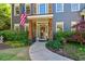 Inviting front entrance showcasing a walkway leading to the blue front door and lush, landscaped garden at 3578 Hope Rd, Cumming, GA 30041