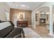 Stylish living room with piano, massage chair, fireplace and built-in shelving at 3578 Hope Rd, Cumming, GA 30041