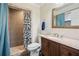 Well-maintained bathroom features a spacious shower and vanity with granite countertop at 140 Apple Valley Dr, Woodstock, GA 30188