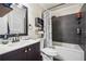 Cozy bathroom featuring a shower-tub combo, modern vanity and stylish fixtures at 140 Apple Valley Dr, Woodstock, GA 30188