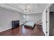 Spacious bedroom with hardwood floors, a ceiling fan, and lots of natural light from one window at 2180 Mill Garden Run, Buford, GA 30519