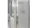 Frosted glass shower with glass door at 2180 Mill Garden Run, Buford, GA 30519