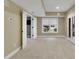 Bright finished basement with natural light, neutral walls and carpet flooring at 3022 Woodbridge Ln, Canton, GA 30114