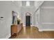 Grand foyer featuring hardwood floors, high ceilings, and elegant entryway decor at 3022 Woodbridge Ln, Canton, GA 30114