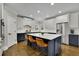 Stylish kitchen featuring a large island, modern appliances, and ample seating at 3022 Woodbridge Ln, Canton, GA 30114