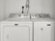 Close up of a white Maytag washer and dryer at 3022 Woodbridge Ln, Canton, GA 30114