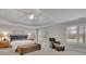 Spacious main bedroom features a trey ceiling, neutral carpet, and an abundance of natural light at 3022 Woodbridge Ln, Canton, GA 30114