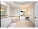 Bright bathroom features double vanity, soaking tub, and granite countertops at 5888 Riverstone Cir # 15, Atlanta, GA 30339