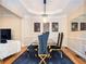 Stylish dining room featuring a modern chandelier, designer decor, and hardwood floors at 5888 Riverstone Cir # 15, Atlanta, GA 30339