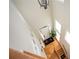 Bright, airy foyer with hardwood floors and a view of the front door and staircase at 5888 Riverstone Cir # 15, Atlanta, GA 30339