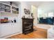 Inviting living room featuring a fireplace, built-in shelving, and hardwood floors at 5888 Riverstone Cir # 15, Atlanta, GA 30339