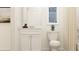 Bright bathroom with a sleek white vanity, a contemporary mirror, and stylish decor at 120 Sunny Side Way, Acworth, GA 30102